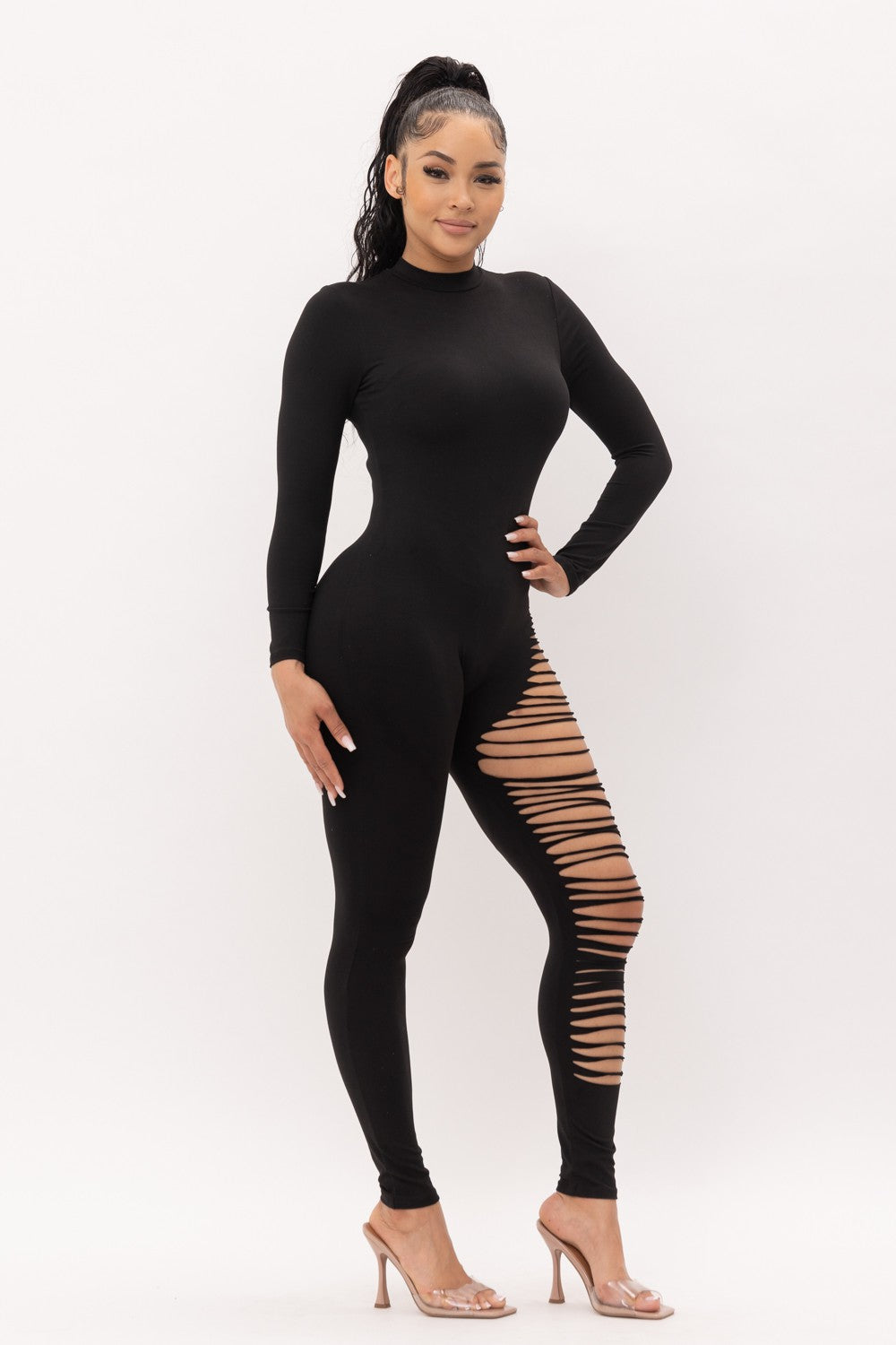 Long sleeve ripped side cutout jumpsuit in black — full length front view