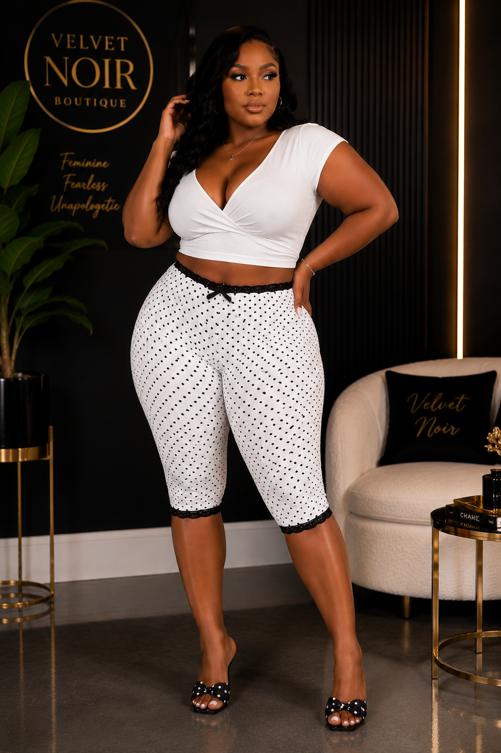 Plus size black polka dot lace trim capri pants - front view